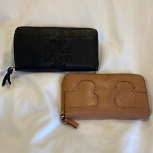 Tory Burch continental wallets.Black and Tan.Very good condition.Measures 7.5x4”